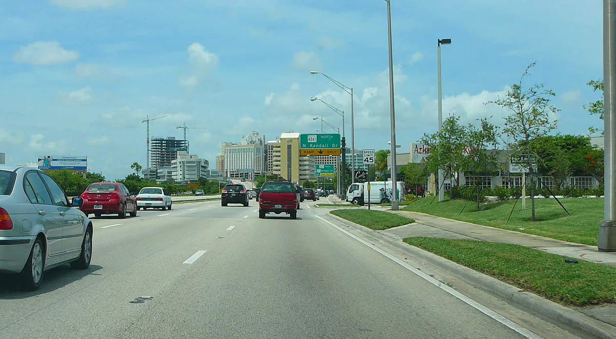 Tree-lined corridor along Pinecrest Parkway in Pinecrest, Florida